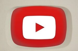 A red and white logo of youtube.